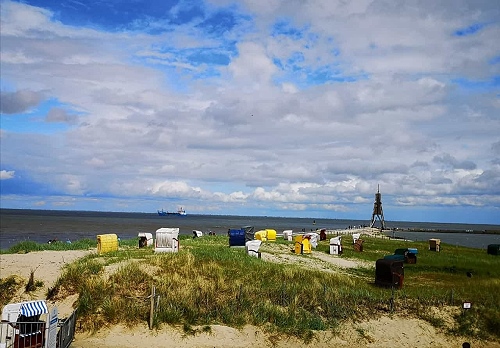 Cuxhaven Sandstrand mit Blick auf Kugelbake im Urlaub in einer Ferienwohnung mit Hund